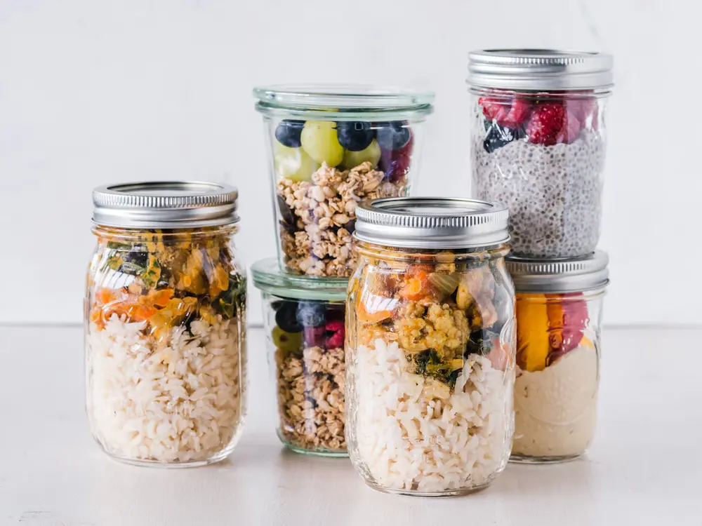 Assortment of meal prep containers on a kitchen counter